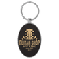 3" x 1 3/4" Laserable Leatherette/Metal Black/Gold Oval Keychain (Sold by Case of 50)