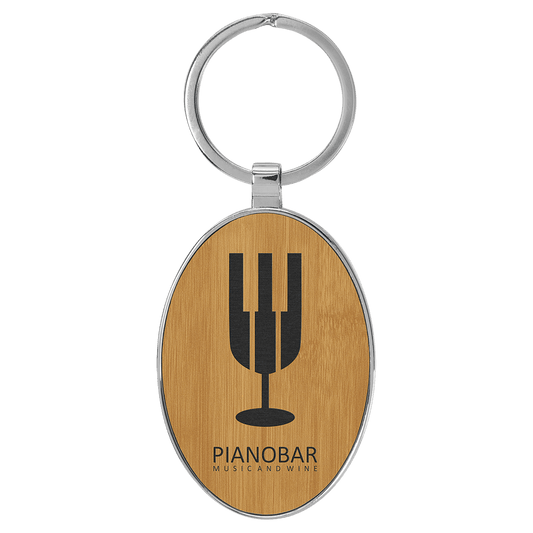 3" x 1 3/4" Laserable Leatherette/Metal Bamboo Oval Keychain (Sold by Case of 50)