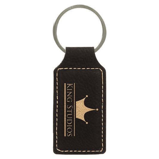 2 3/4" x 1 1/4" Black/Gold Laserable Leatherette Rectangle Keychain (Sold by Case of 50)