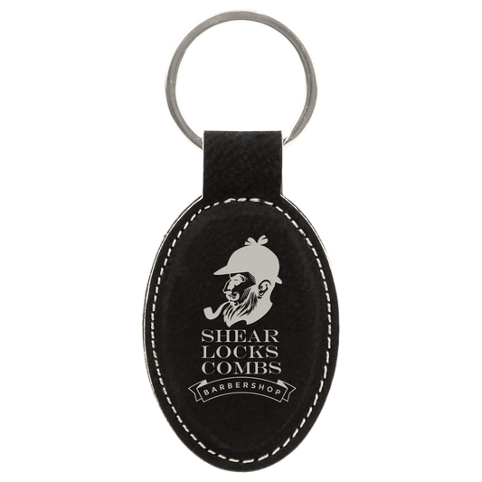 3" x 1 3/4" Black/Silver Laserable Leatherette Oval Keychain (Sold by Case of 50)