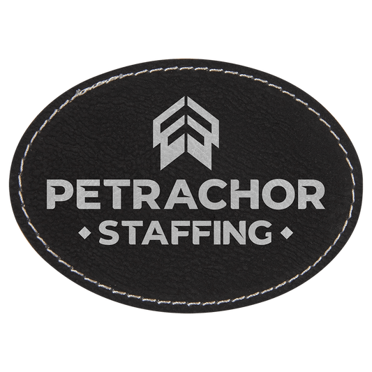 3 1/2" x 2 1/2" Oval Black/Silver Laserable Leatherette Patch with Adhesive (Sold by Case of 25)